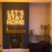 Let's Stay Home Neon Sign in Paradise Yellow