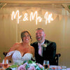 Cosy warm white Surname Wedding Neon Sign.jpg__PID:7ce62f97-9268-4d84-b563-6a01ce87256a