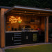 Outdoor kitchen bar setup with wooden cabinetry, stainless steel grill, sink, shelves, and a glowing neon sign reading “The Drunken Duck” with a duck neon sign. The scene is set at night in a backyard with artificial turf and dark foliage in the background.