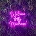 Welcome to the madhouse neon sign in love potion pink