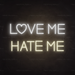 Love Me Hate Me Neon Sign in Cosy Warm White 