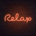 Relax Neon Sign in Sunset Orange