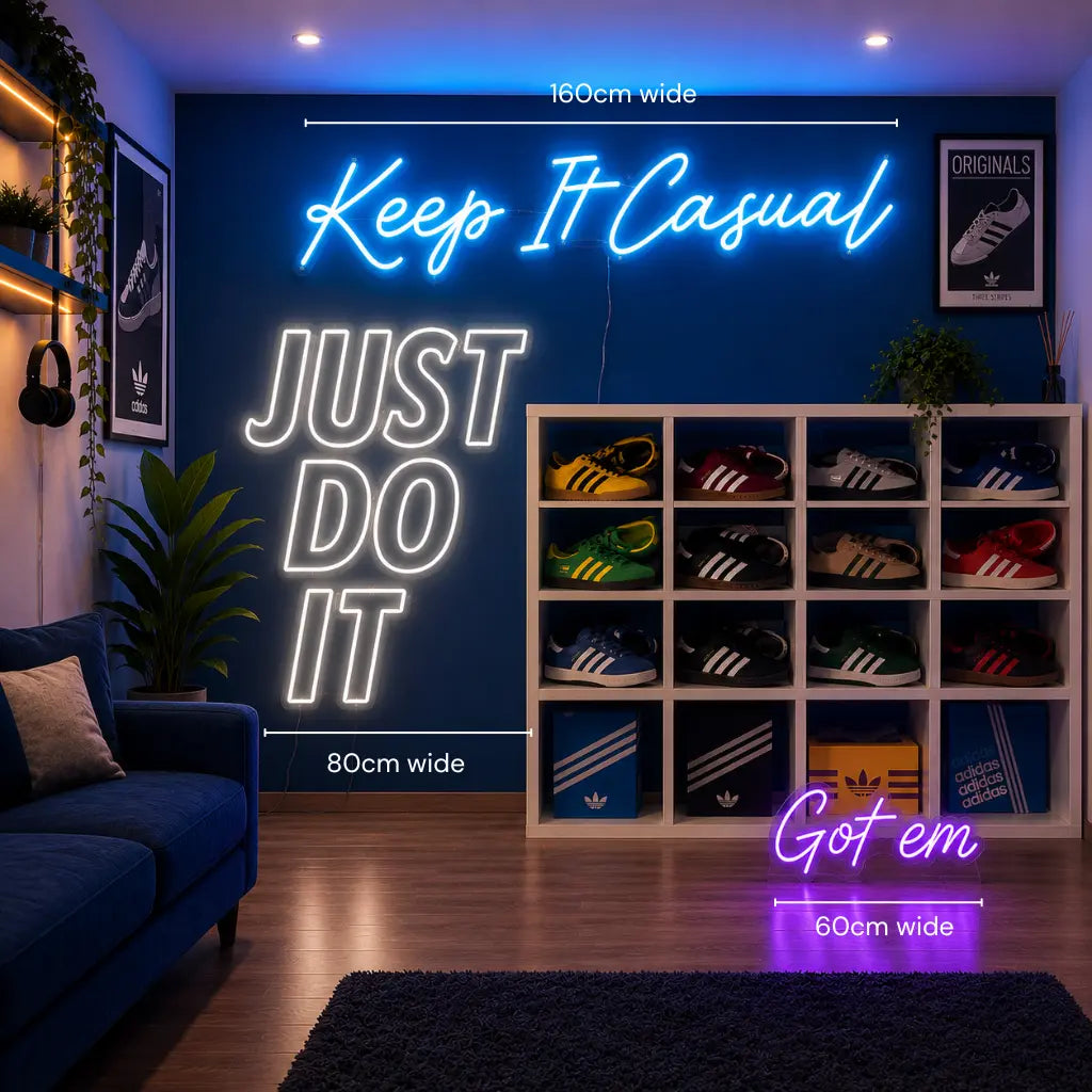 A styled room scene showing a blue wall with neon-style text reading 'Keep It Casual' and 'JUST DO IT,' plus size annotations '160cm wide,' '80cm wide,' and '60cm wide.' A white shoe rack filled with colorful sneakers stands against the wall, with additional neon text 'Got em' and '60cm wide' below.
