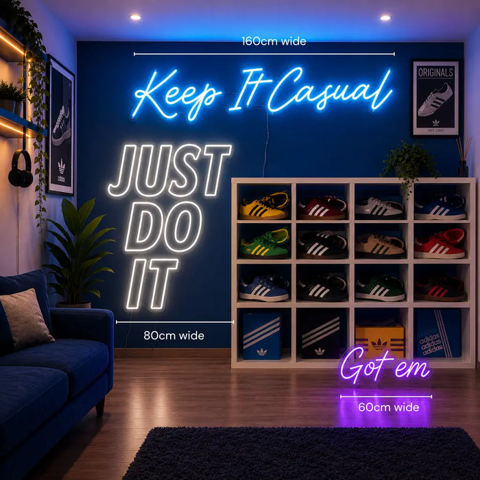 A styled room scene showing a blue wall with neon-style text reading 'Keep It Casual' and 'JUST DO IT,' plus size annotations '160cm wide,' '80cm wide,' and '60cm wide.' A white shoe rack filled with colorful sneakers stands against the wall, with additional neon text 'Got em' and '60cm wide' below.