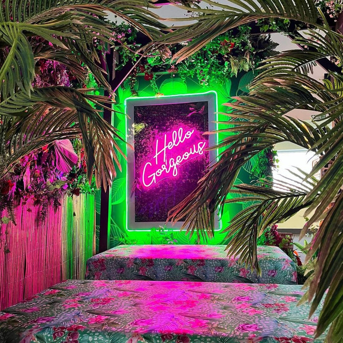 Pink Hello Gorgeous Neon Sign In Jungle Room