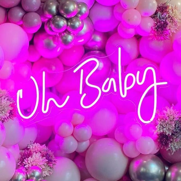 Pink Oh Baby neon sign with pink and white balloons. Baby shower decor by @hiredbykatie