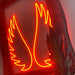 Red angel wings neon sign in frame