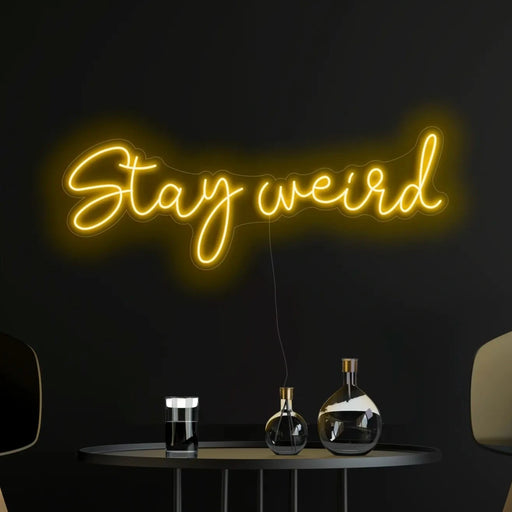 Stay weird Neon Sign in paradise yellow