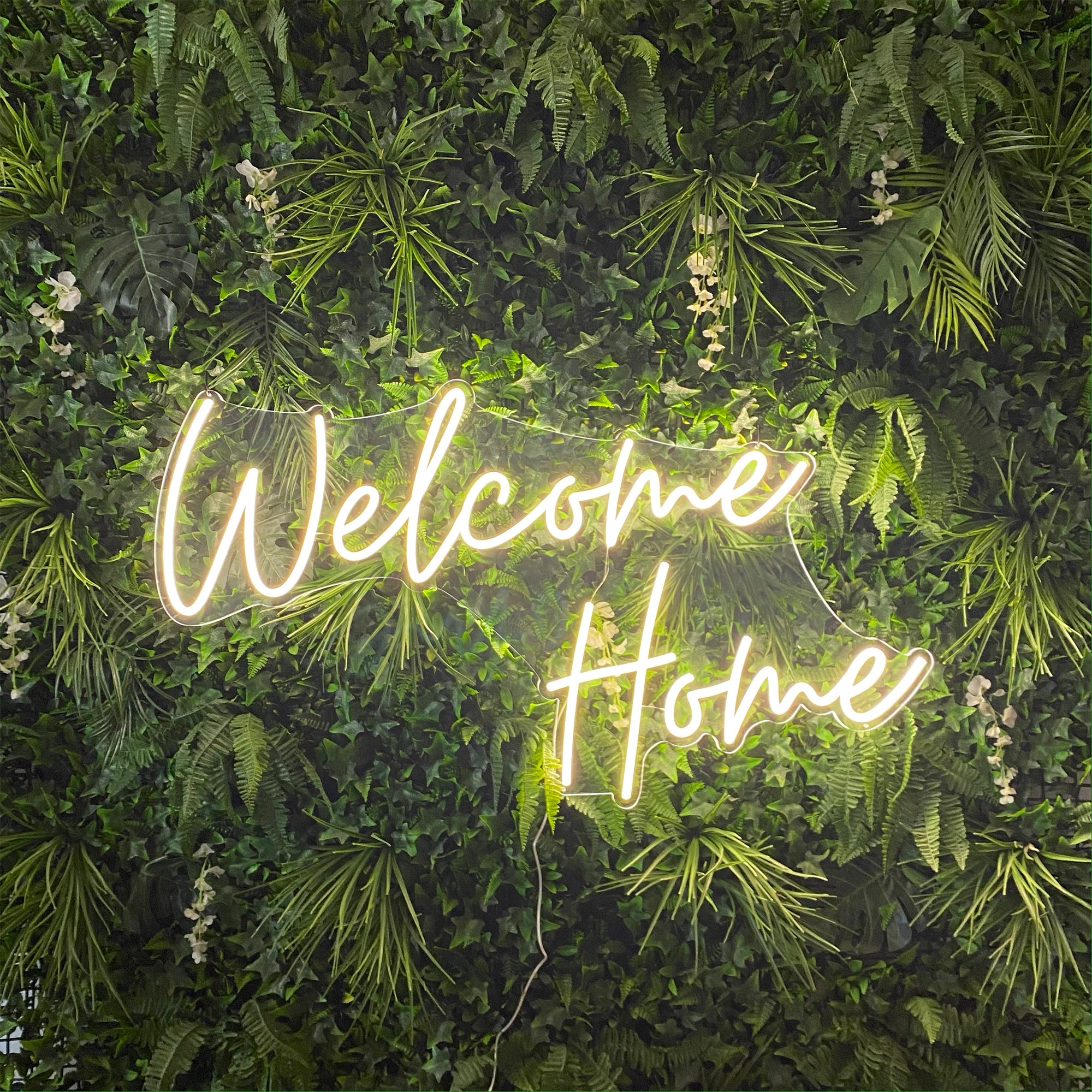 Welcome Home Neon Sign in cosy warm white