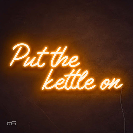 "Put the kettle on" neon sign in sunset orange.