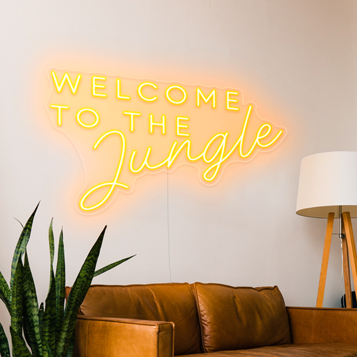 Yellow welcome to the jungle neon sign